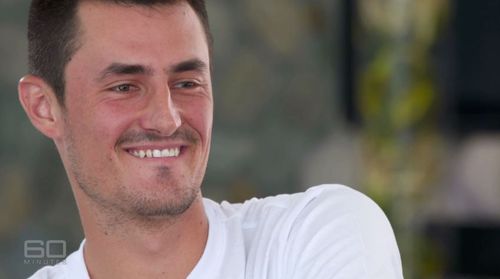 Bernard Tomic has accused Lleyton Hewitt of threatening him.