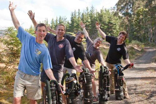 Dr Richard Harris (second left) and his diving partner Craig Challen (centre) played a key role in the rescue mission. Picture: The Wet Mules