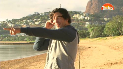 "Shark!" Johnathan Thurston spots the animal after the interview. 