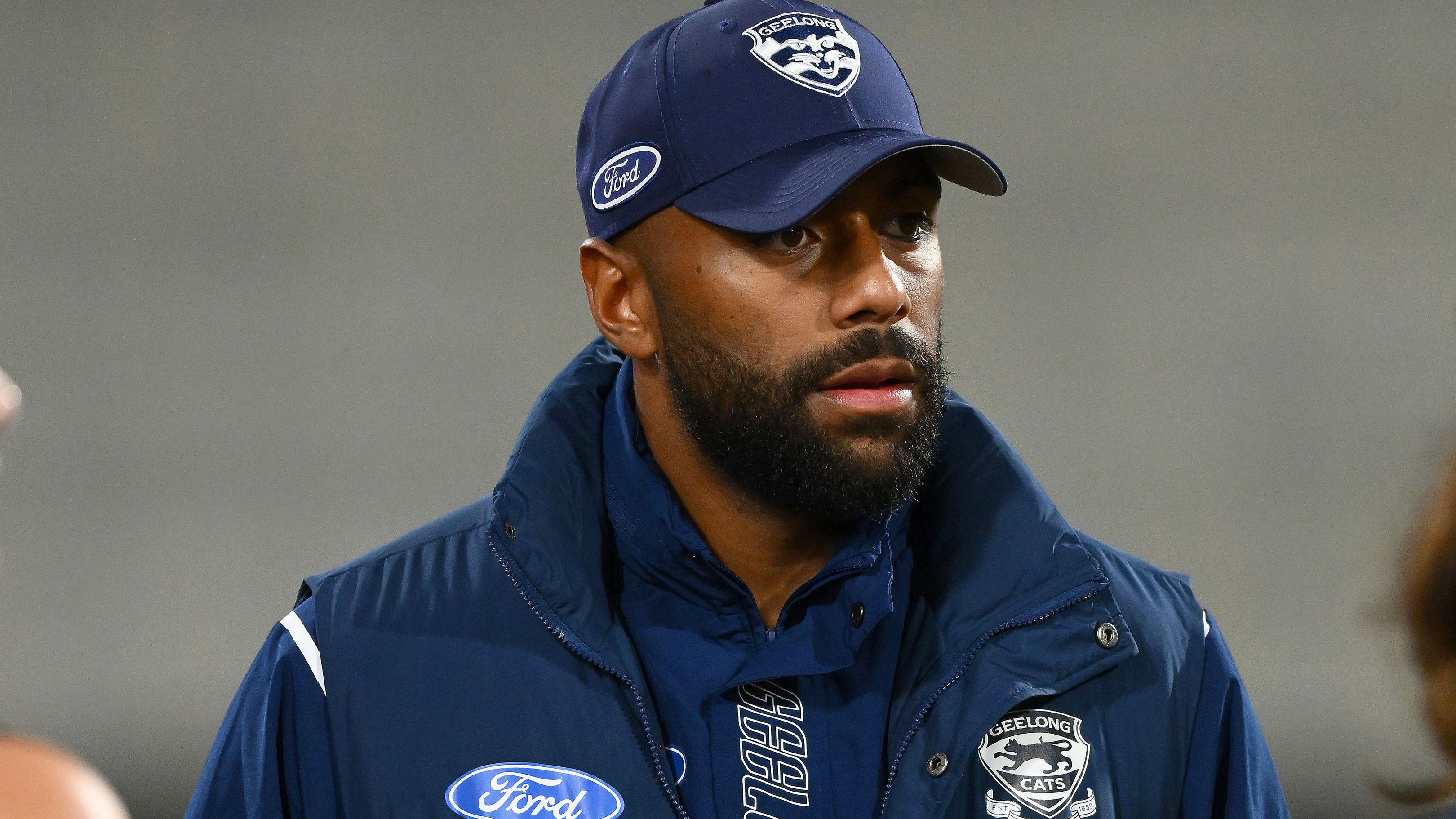 GEELONG, AUSTRALIA - MAY 27: Esava Ratugolea of the Cats stands at the huddle after being subbed off during the round 11 AFL match between Geelong Cats and Greater Western Sydney Giants at GMHBA Stadium, on May 27, 2023, in Geelong, Australia. (Photo by Morgan Hancock/AFL Photos/via Getty Images)