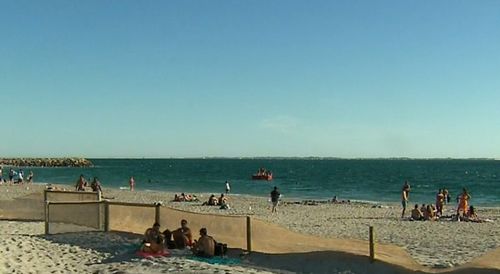 A man has died after being pulled unconscious from the water on Fremantle South Beach in Perth.