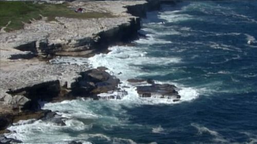 Search and rescue operation underway after man swept from rocks in Kurnell, in Sydney's south