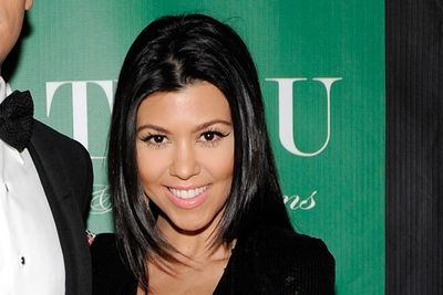 Kourtney Kardashian partied at the Chateau Nightclub & Gardens at the Paris Las Vegas. With her glossy hair and those fluttering lashes, it may not be new ground but it's a look that works. Loving the winged eyeliner too!
