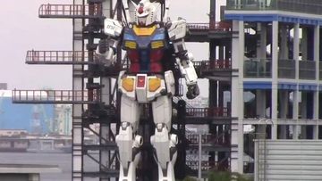 The 60 foot tall robot has over 200 pieced and can walk and kneel