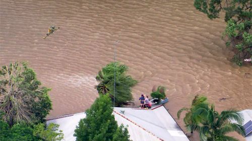 NSW Flood Update; rescue chopper to save 3 stranded people and a dog near woodburn at buckendoon