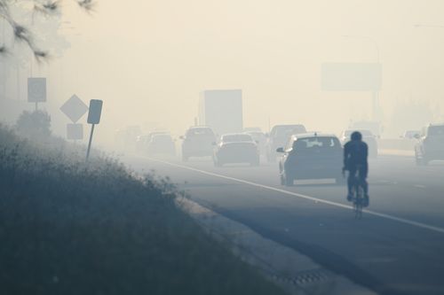 Thick smoke is blanketing Sydney today as fire crews continue to battle the blaze. (AAP)