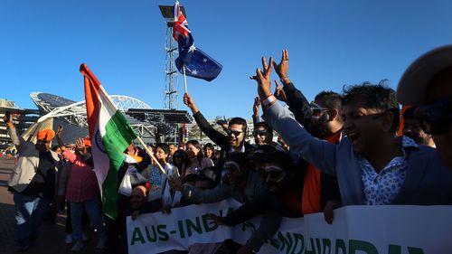 Members of the Australian Indian community await the arrival of Prime Minister Modi at Qudos Bank Arena on May 23, 2023 in Sydney, Australia.