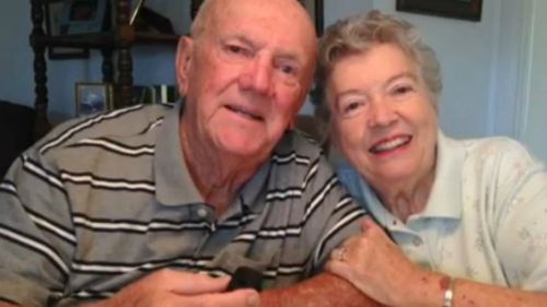 Ken and Ann Fredericks with their wedding cake. (Source: Florida Today)