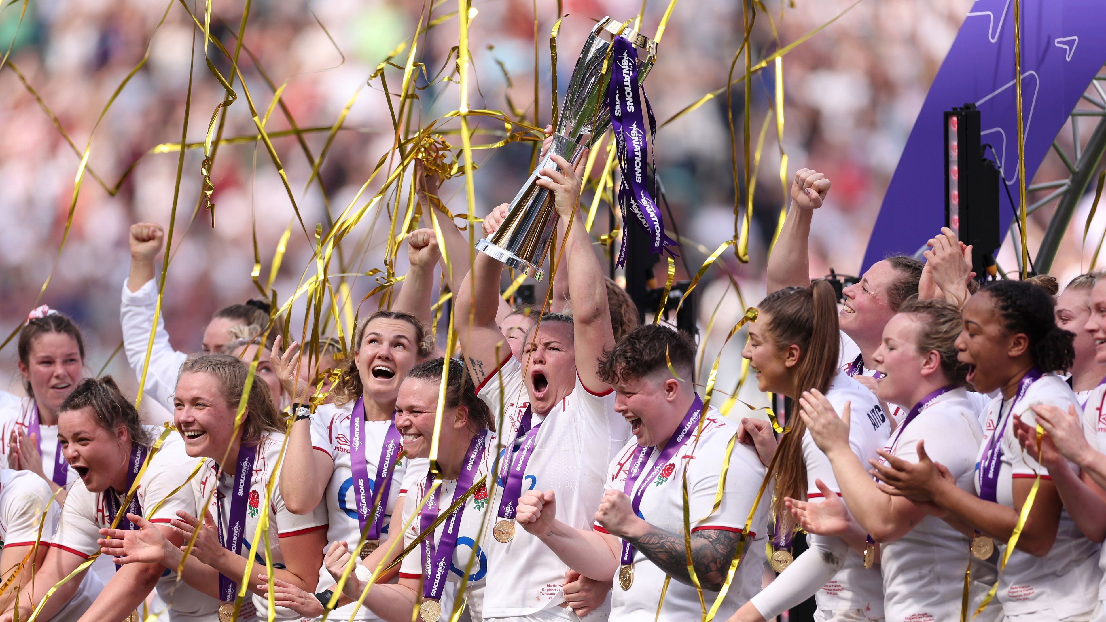 Marlie Packer of England lifts the women&#x27;s Six Nations trophy.