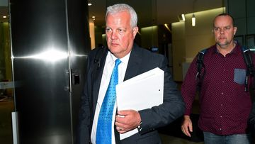 Former Mine Subsistence Board manager Darren Bullock, departs after giving evidence at the Independent Commission Against Corruption in Sydney, April 7, 2015. (AAP)