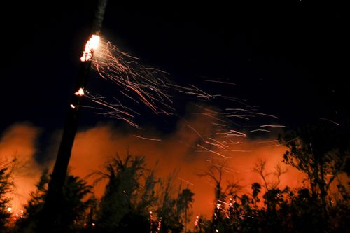 The most destructive among several new wind-driven blazes erupted hours before dawn on the rugged slopes of the San Bernardino National Forest.