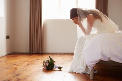 Bride In Bedroom Having Second Thoughts Before Wedding