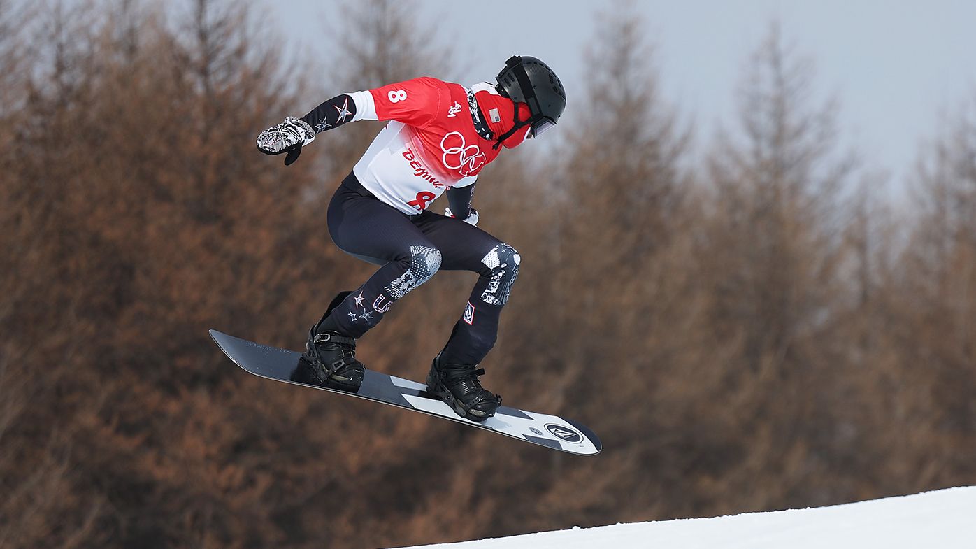 Hagen Kearney of Team United States performs a trick during the Men&#x27;s Snowboard Cross Qualification on Day 6 of the Beijing 2022 Winter Olympics.