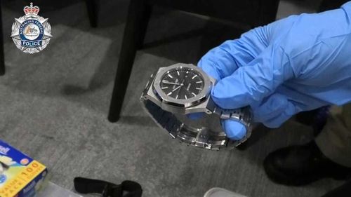 A luxury Swiss watch from Audemars Piguet was also confiscated during the 2022 raid.