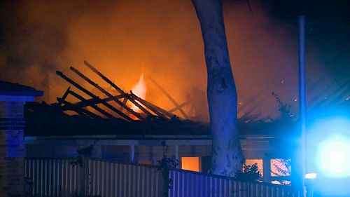 Neighbouring houses had to be evacuated when strong winds fanned the blaze. Image: 9News