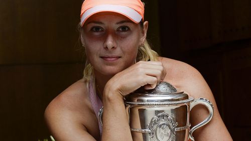 Maria Sharapova with her final Grand Slam trophy, the 2014 French Open.