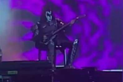 KISS star Gene Simmons ill on stage, performs seated on a chair