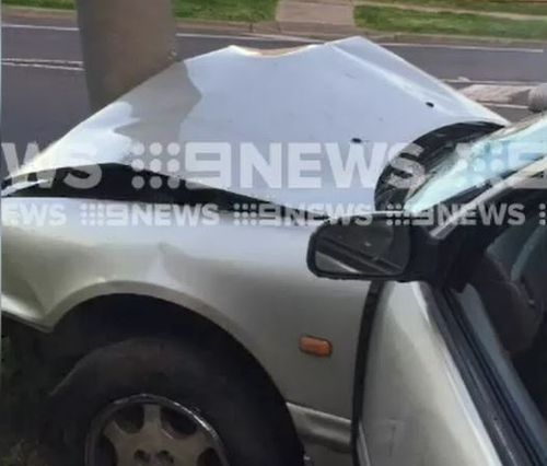 The stolen car crashed into a power pole after failing to navigate a turn. 