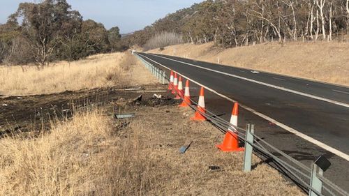 A major highway south of Canberra was closed for 10 hours after a fiery two-car crash overnight. Picture: 9NEWS.