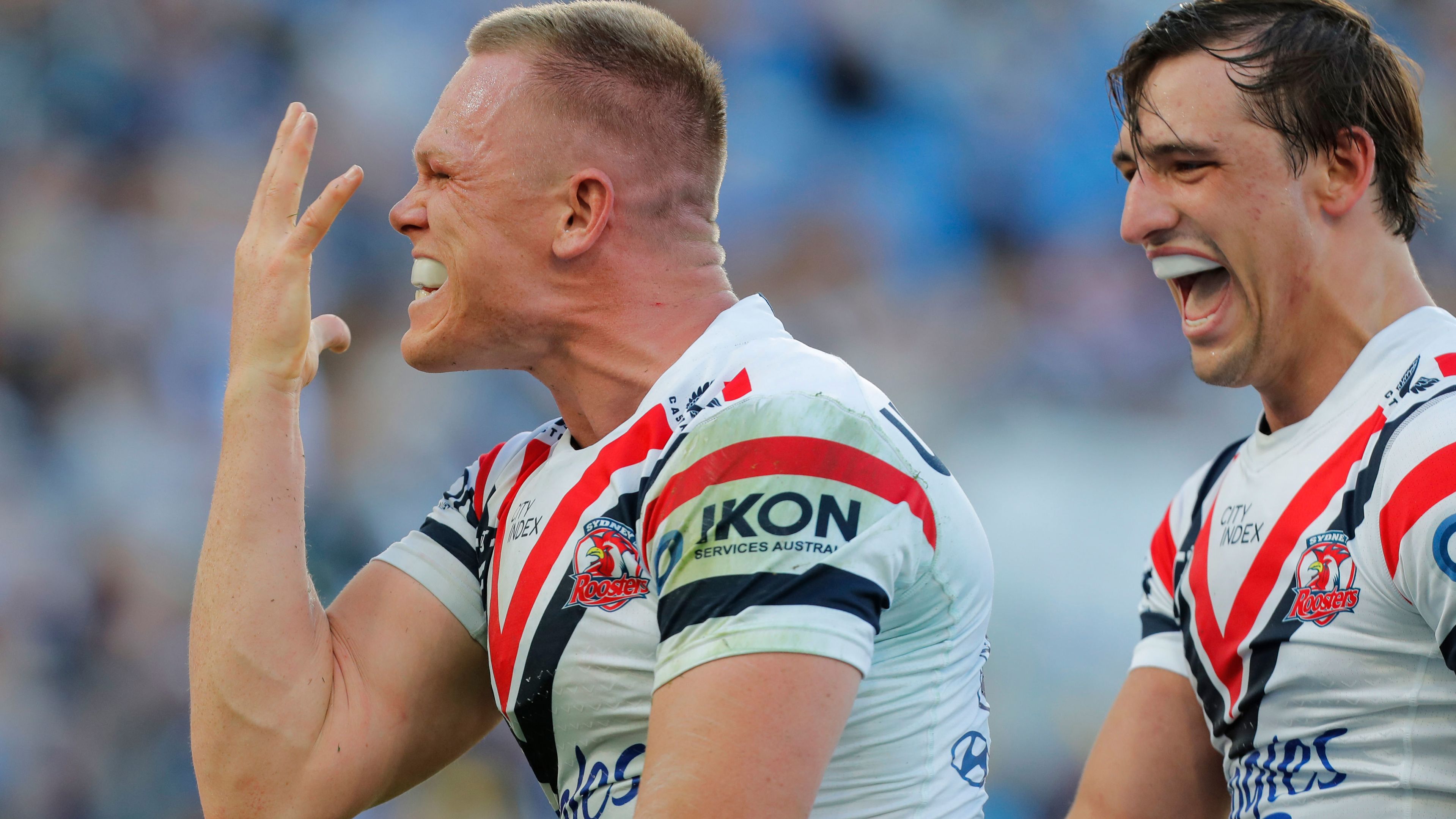 Lindsay Collins reacts after scoring a try against the Gold Coast Titans. 