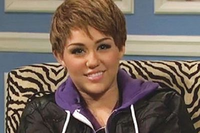 Miley looks pretty chipmunk-y as a dude - but it was all in the name of Bieber Fever as she donned a boyish mop for a skit on <i>Saturday Night Live</i>.