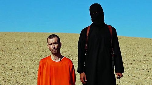 Part of a video released by the Islamic State in 2014 shows Mohammed Emwazi, dubbed Jihadi John, holding a knife before purportedly executing British journalist David Cawthorne Haines. (Photo: AP).