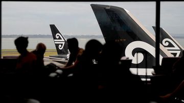 Passengers wait in the Air New Zealand lounge at Auckland International Airport