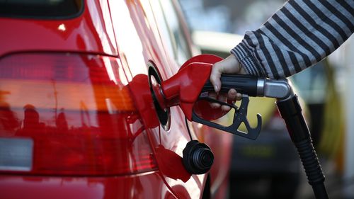 Women filling up at petrol station