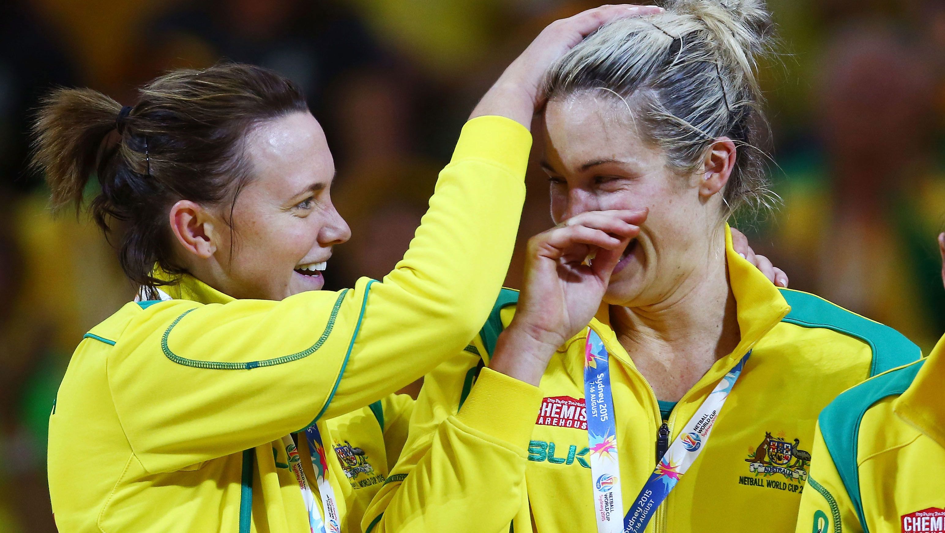 Natalie Butler (right) wells up with emotion after the 2015 Netball World Cup gold medal match between Australia and New Zealand.