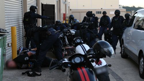 Officers raided the Wetherill Park headquarters last night. (NSW Police)