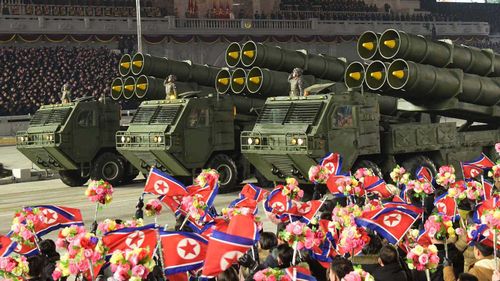 North Korea rolled out developmental ballistic missiles designed to be launched from submarines and other military hardware in a parade that punctuated leader Kim Jong Un's defiant calls to expand his nuclear weapons program.