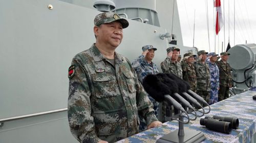 China's leader Xi Jinping inspects a naval parade in the South China Sea. (Photo: Chinese Defence Ministry).