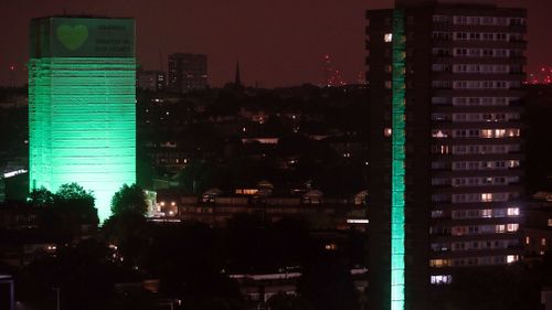 Grenfell Tower was illuminated in green to mark the exact moment the fire broke out in a kitchen. Picture: Getty