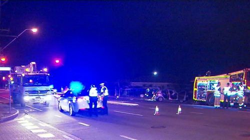 The crash occurred at 10pm yesterday and the woman was trapped with serious injuries. (9NEWS)