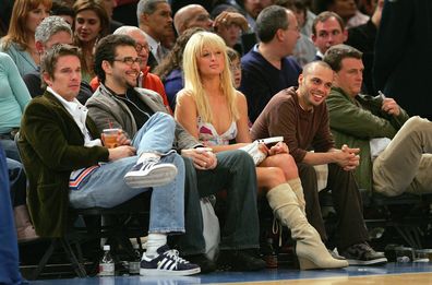 NEW YORK - NOVEMBER 23:  Paris Hilton and Ethan Hawke (L)  watch game action between the Atlanta Hawks and the New York Knicks on November 23, 2004 at Madison Square Garden in New York City, New York. The Knicks defeated the Hawks 104-88.  NOTE TO USER: User expressly acknowledges and agrees that, by downloading and/or using this Photograph, user is consenting to the terms and conditions of the Getty Images License Agreement.  (Photo by Ezra Shaw/Getty Images) *** Local Caption *** Paris Hilton