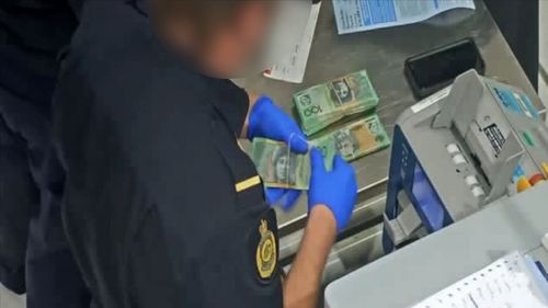 At the same time, ABF currency detection dogs were sweeping the luggage being loaded onto the man’s flight, and identified two checked bags both belonging to the man. Between the bags a further $100,200 was seized, marking a total of $145,200.