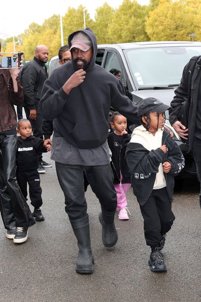 Kanye West, Saint West, Psalm West and Chicago West attend the Balenciaga Womenswear Spring/Summer 2023 show.