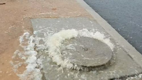 Storm water drains overflowed. (9NEWS)