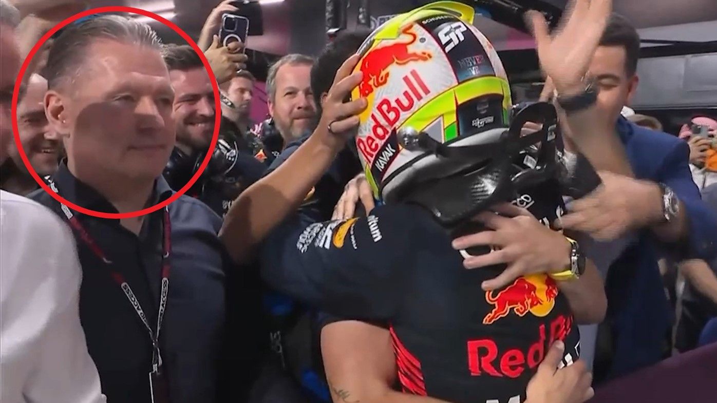 Max Verstappen&#x27;s father, Jos, watches as Red Bull team members congratulate race winner Sergio Perez after the Saudi Arabian Grand Prix.