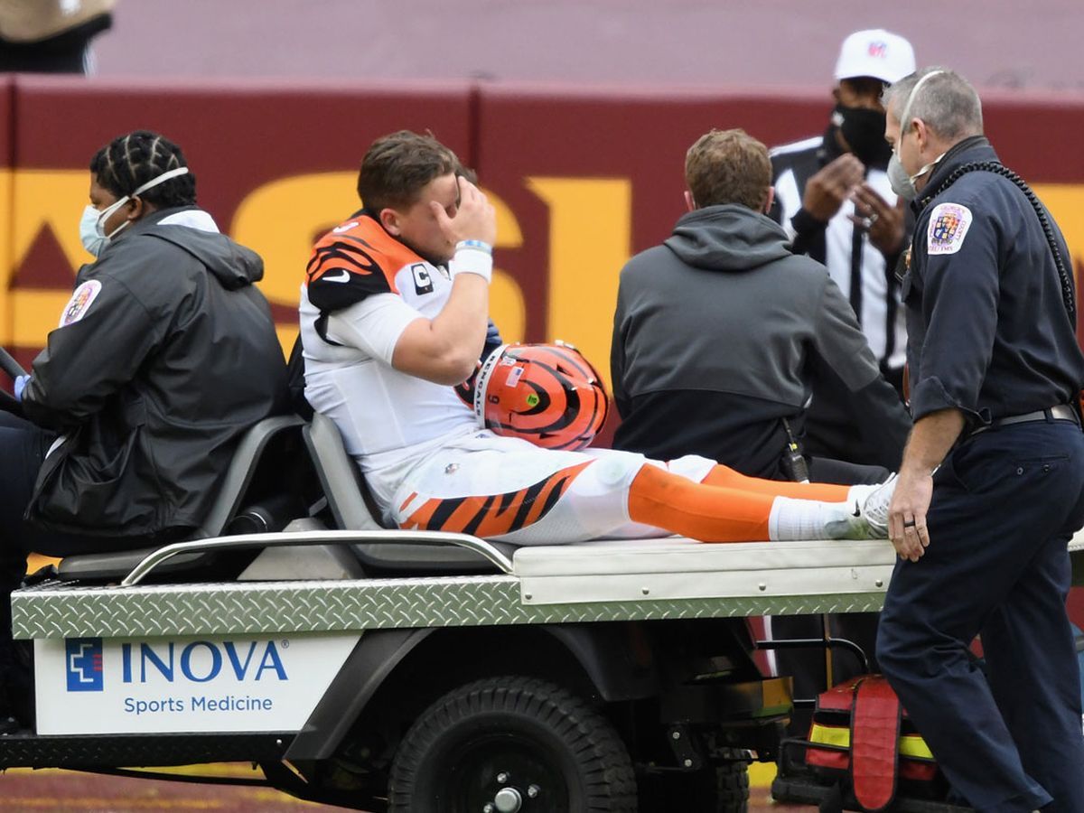 See ya next year': Bengals QB Burrow carted off field after suffering knee  injury