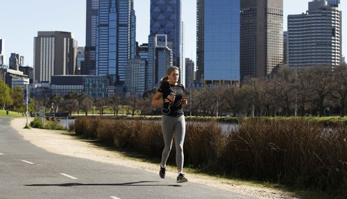 People are seen exercising along the Yarra River on September 6, 2020 in Melbourne, Australia. 