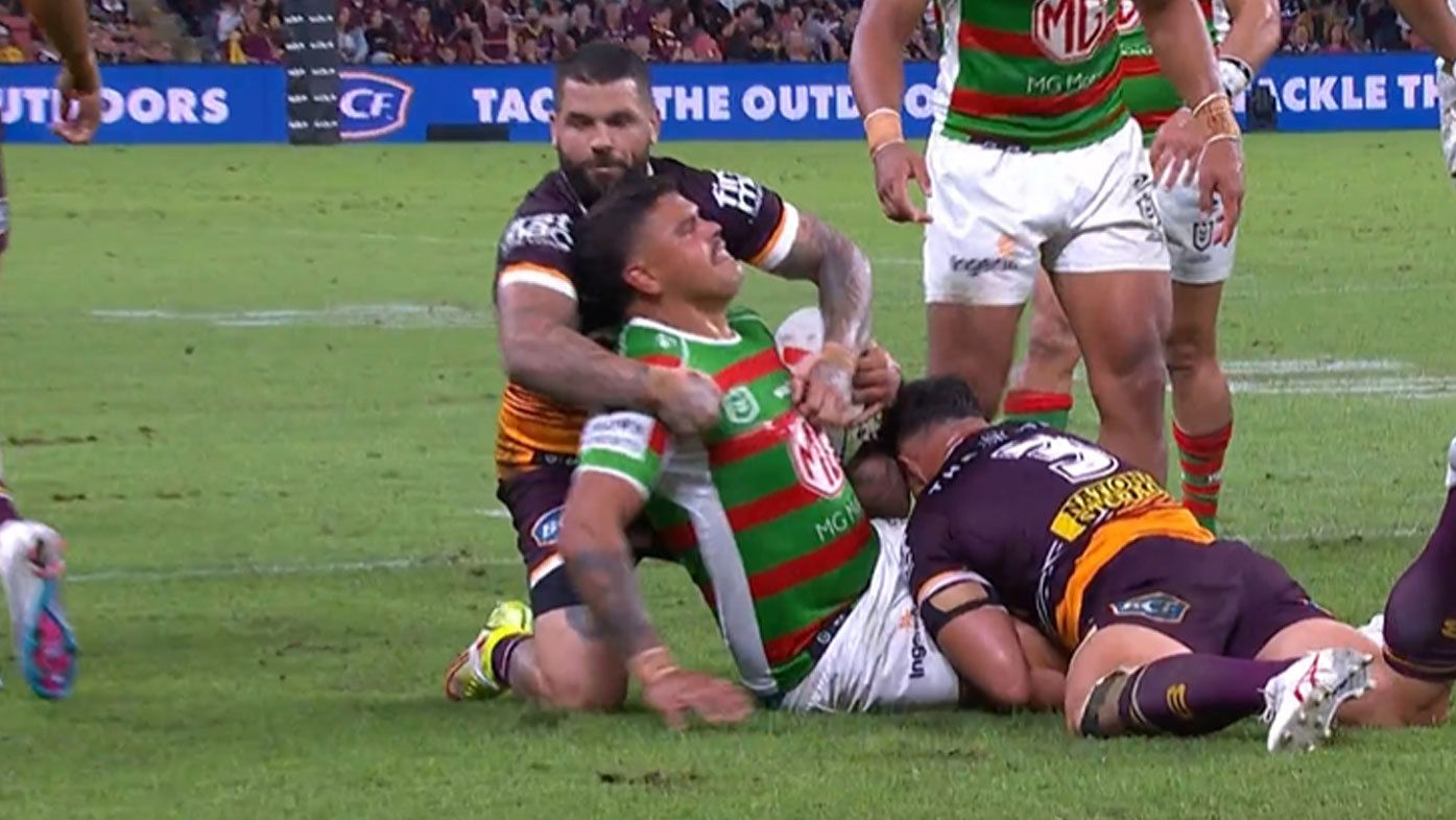Latrell Mitchell and former Souths skipper Adam Reynolds were involved in a fiery incident at the end of the first half
