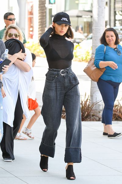 Olivia Culpo in LA on July 19, doubles down on the trend with wide-legged pants.