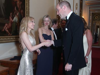 Kylie Minogue speaks with Prince William during a reception for the Royal Marsden NHS Foundation Trust at Buckingham Palace, 2018.