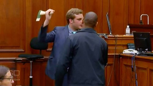 van Breda re-enacts his version of the axe attack in a Cape Town court room. Picture: Supplied