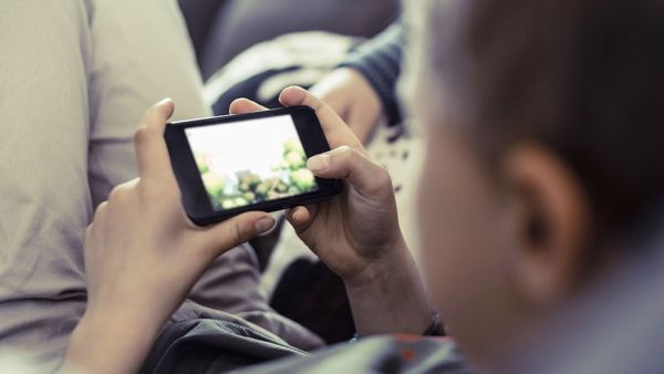 Child using mobile phone