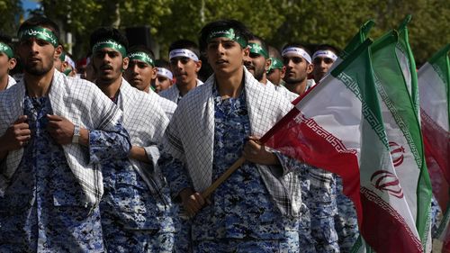 Volunteer troops of the Iranian army march during Army Day parade at a military base in northern Tehran in Iran on Wednesday, April 17.