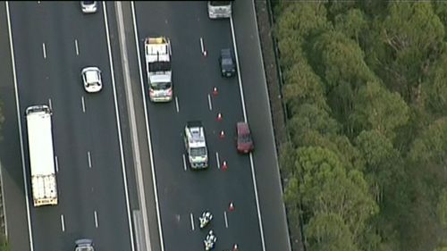 Traffic is backed up for 13 kilometres on the M5 following the freak accident at Hammondville. (9NEW)