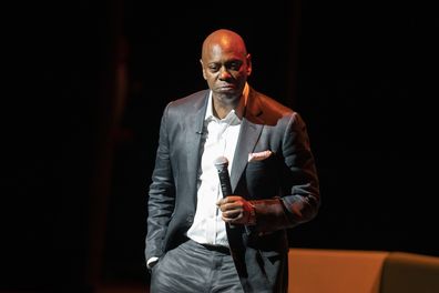 Dave Chappelle performs during a theater dedication ceremony honoring the comedian and actor, and to raise funds to support Duke Ellington School of the Arts in Washington, Monday, June. 20, 2022. 