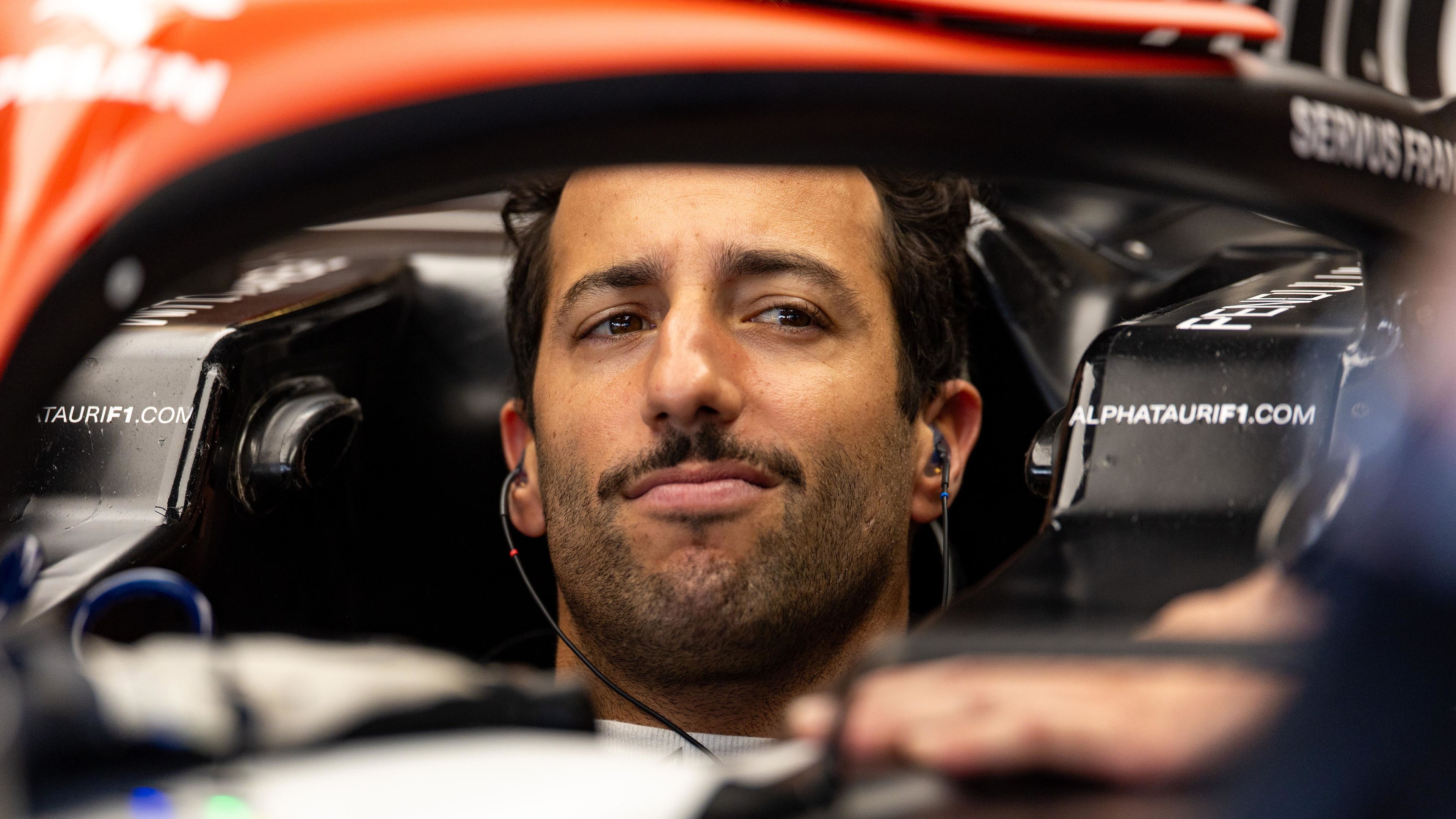 Daniel Ricciardo of Australia and Scuderia AlphaTauri sits in the car during Formula 1 testing at Yas Marina Circuit.